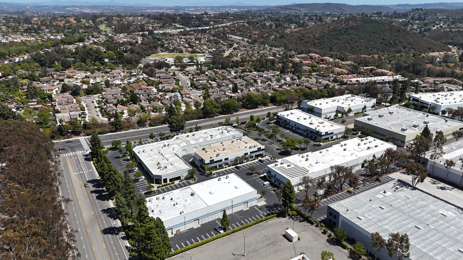 Aerial view of the business park with the freeway in the background